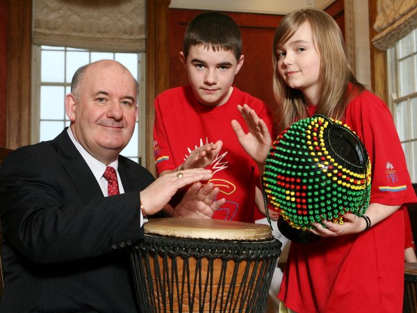Photograph of the Speaker with members of A-Freek-A drumming group at Commonwealth Day 2009
