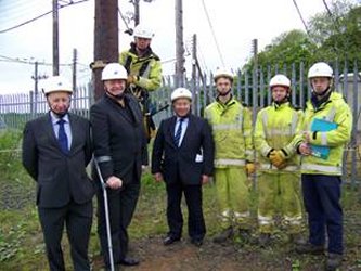 Committee Members with Northern Ireland Electricity apprentices Stewart McConaghy, David Adamson and Ethan Furphy and their instructor Cathill McCarney during the visit to the NIE training centre at Nutts Corner. 