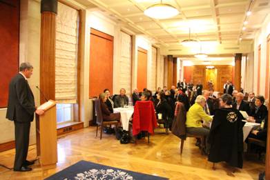 Chair of the Committee (Mr Jim Wells MLA) welcomes groups to the informal reception held in the Long Gallery