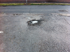 Drumbeg Mews - pothole
