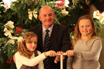 The Speaker, assisted by Catherine and Niamh Cullen at the switching on of the Parliament Buildings Christmas Tree lights