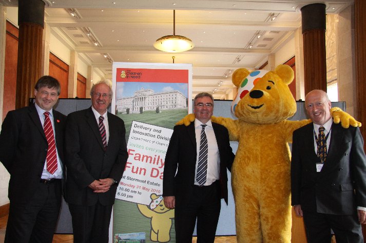 Pictured with Pudsey Bear at the launch of the Bank Holiday Family Fun Day at Parliament Buildings today are (l-r) Basil McCrea MLA, Jim Shannon MP, Tom Kennedy (Director of DFP's Delivery and Innovation Division) and Ronnie McAleese (Event Organiser).